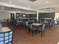 Cafeteria/ breakfast area, connected to the checkin lobby.