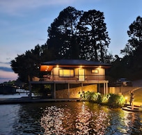 The cottage and the steps to the private swim area.