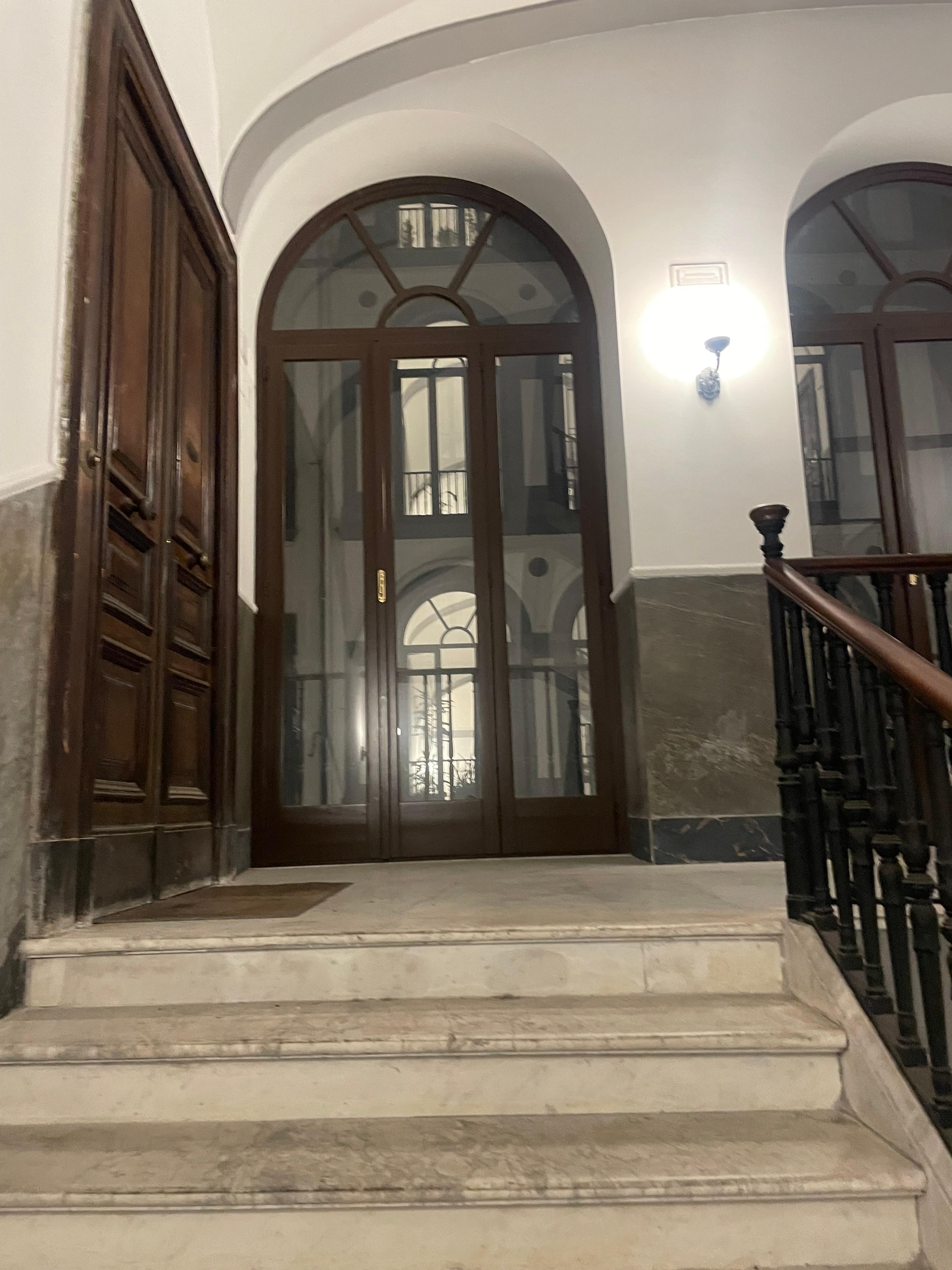 The staircase up to Antica Dimora Pessina located on level 2.