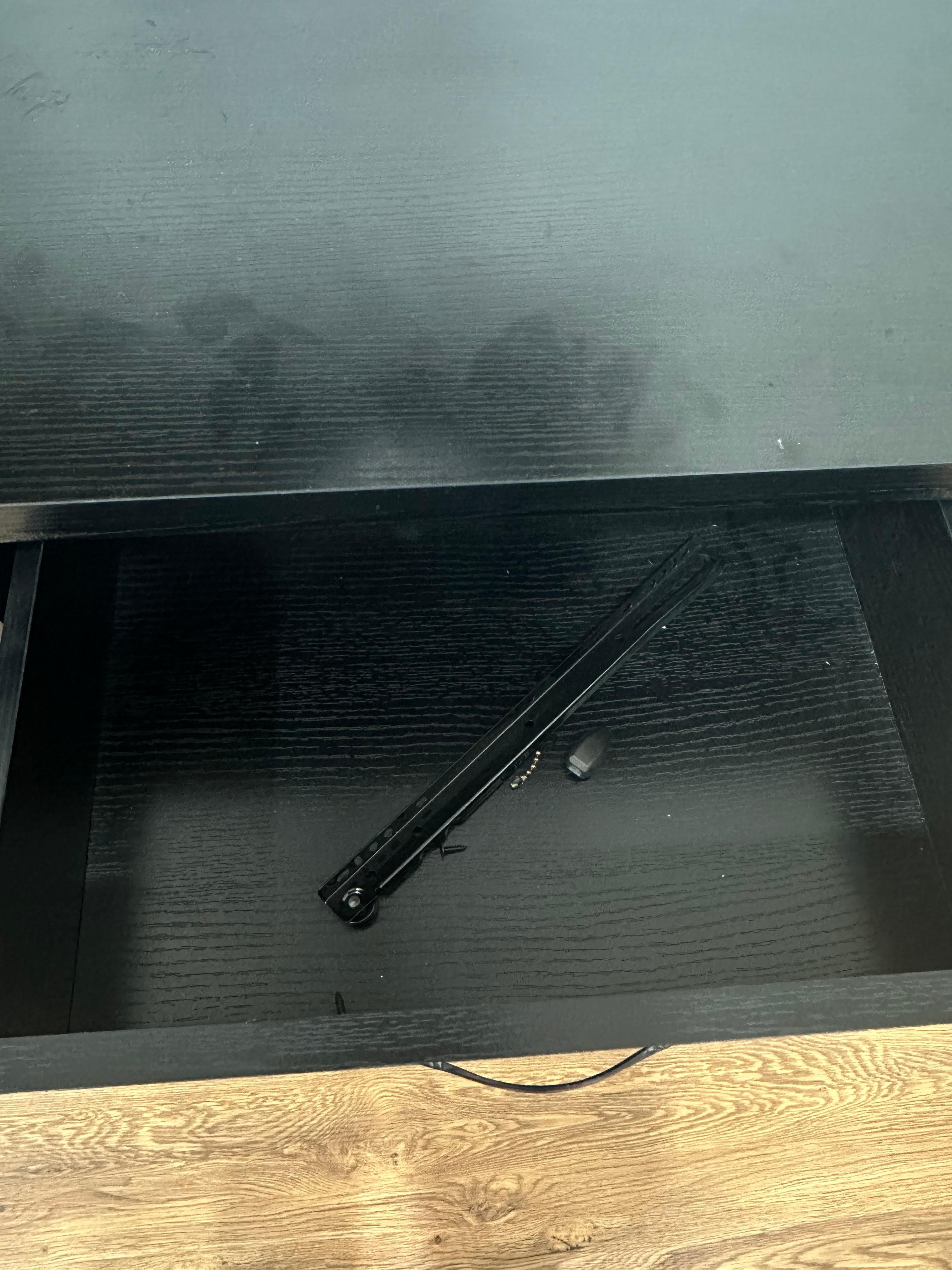 Parts to dresser draw in master room not installed. 