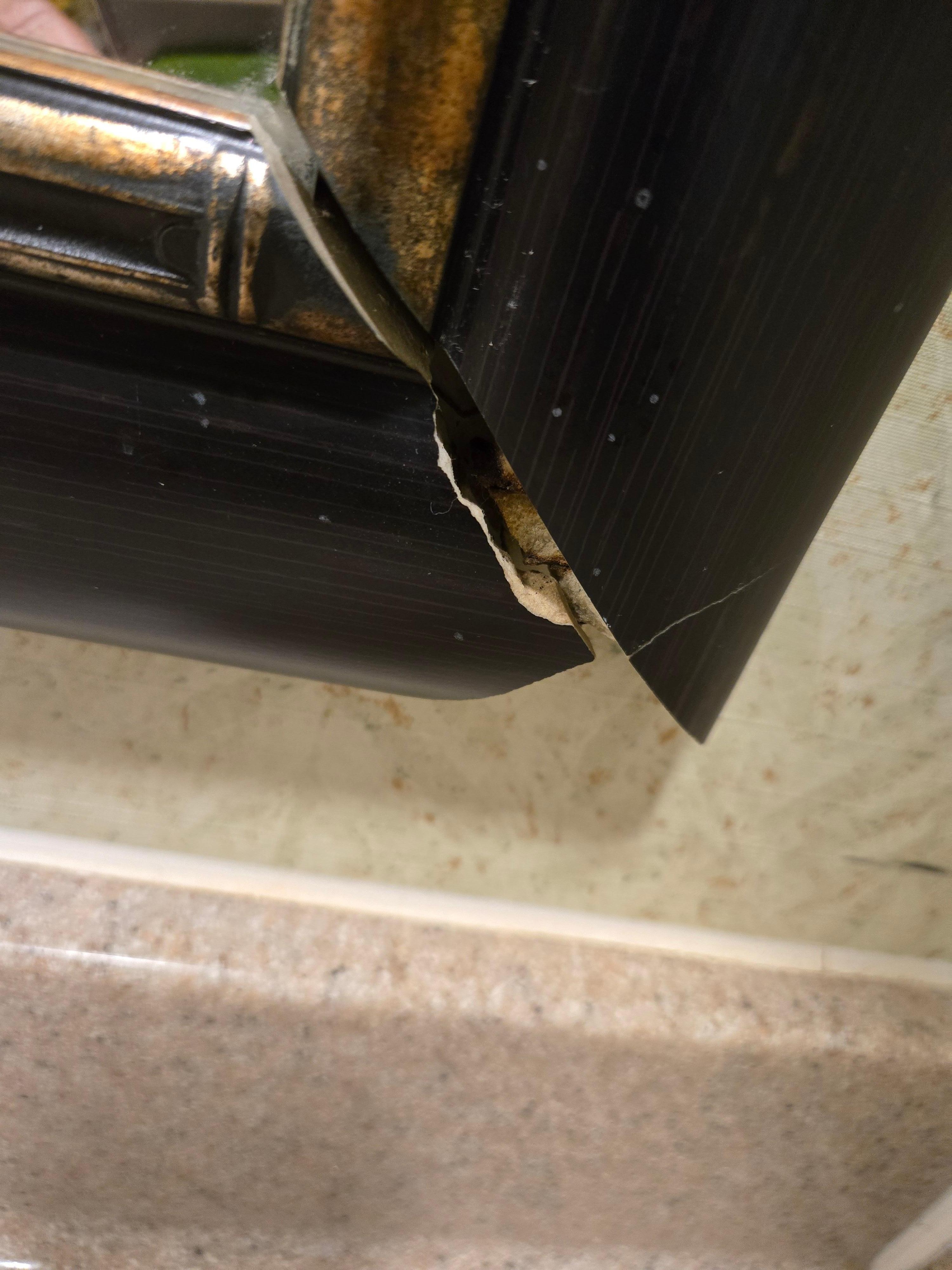 Broken bathroom mirror