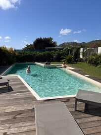 Enjoying the pool and lovely gardens.
