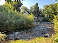 river in front of rooms in building A