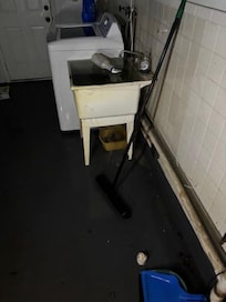 Washing Machine was clogged at the drain pipe but would constantly run rinse cycle and attempt to drain but flooded garage.