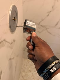 Shower handle. Owner said it was as simple as screwing it back in. Didnât work for us.