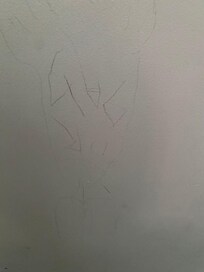 Writing above bed on ceiling