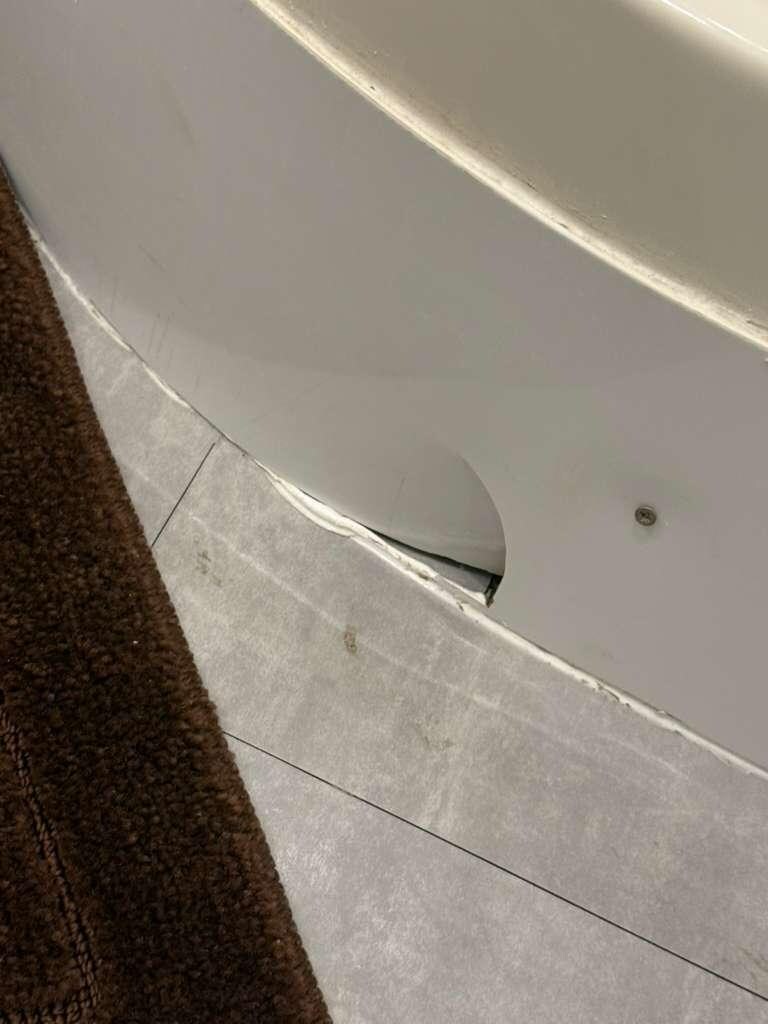 Broken base of shower 