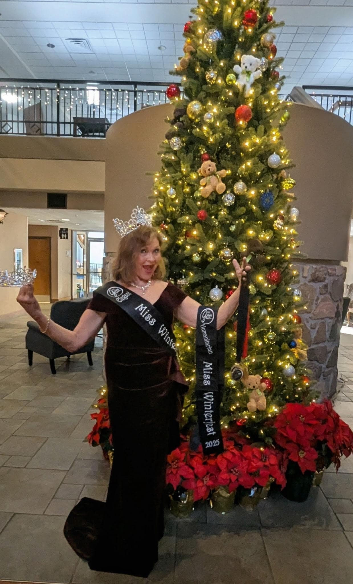 I attended Winterfest pageant and was crowned Miss Elite and Miss Humanitarian, loved taking pictures there in front of the lovely tree!