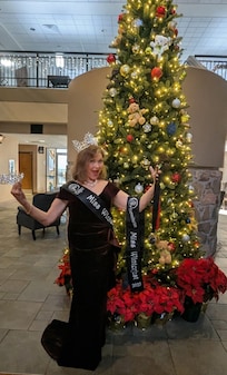 I attended Winterfest pageant and was crowned Miss Elite and Miss Humanitarian, loved taking pictures there in front of the lovely tree!