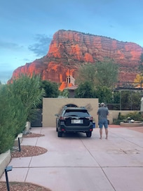Our car & my husband in the driveway, upon arrival.