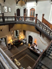 The stairs from reception to the first floor - also a lift available