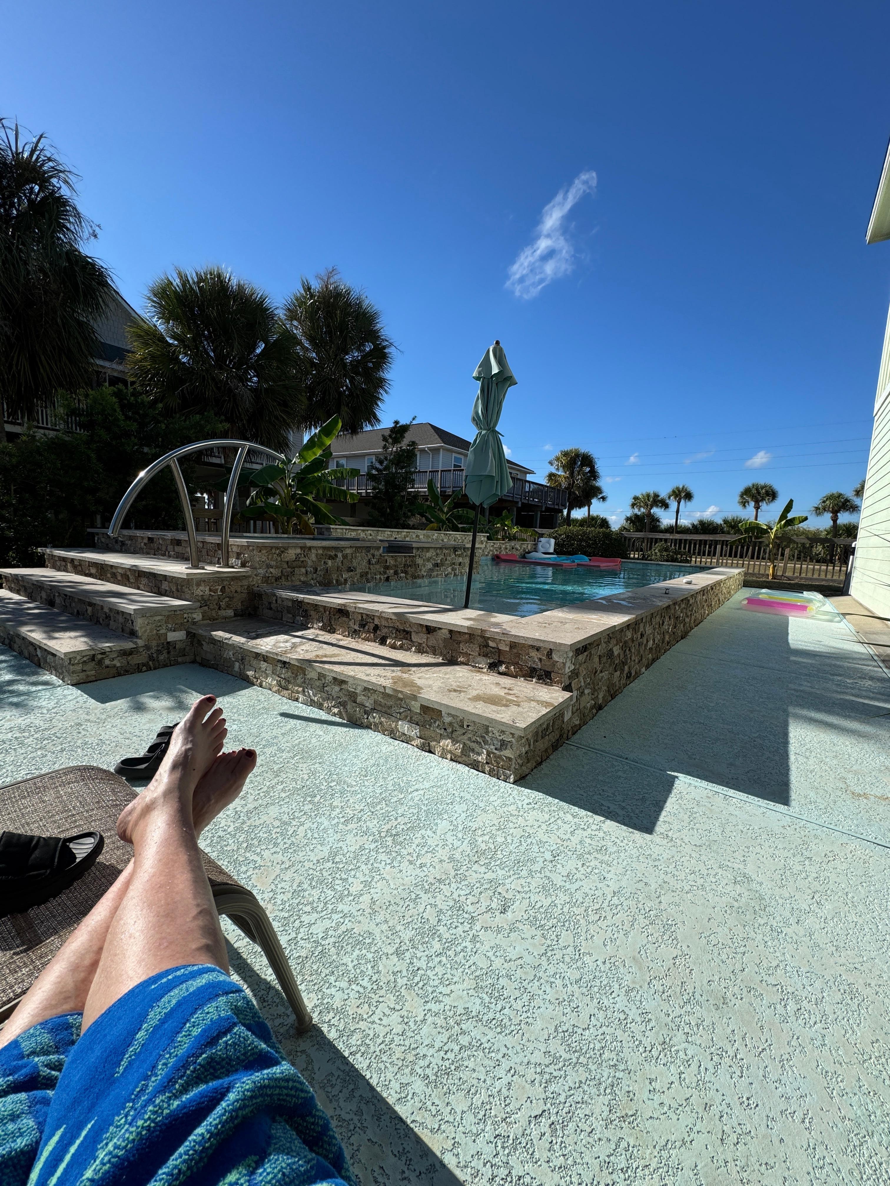 Relaxing by the pool