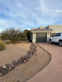 Front yard (partially shown)