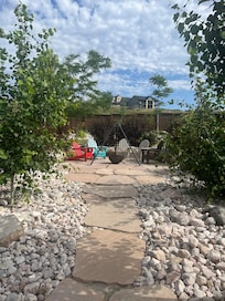 Path to the awesome fire pit. Landscaping was so beautiful.