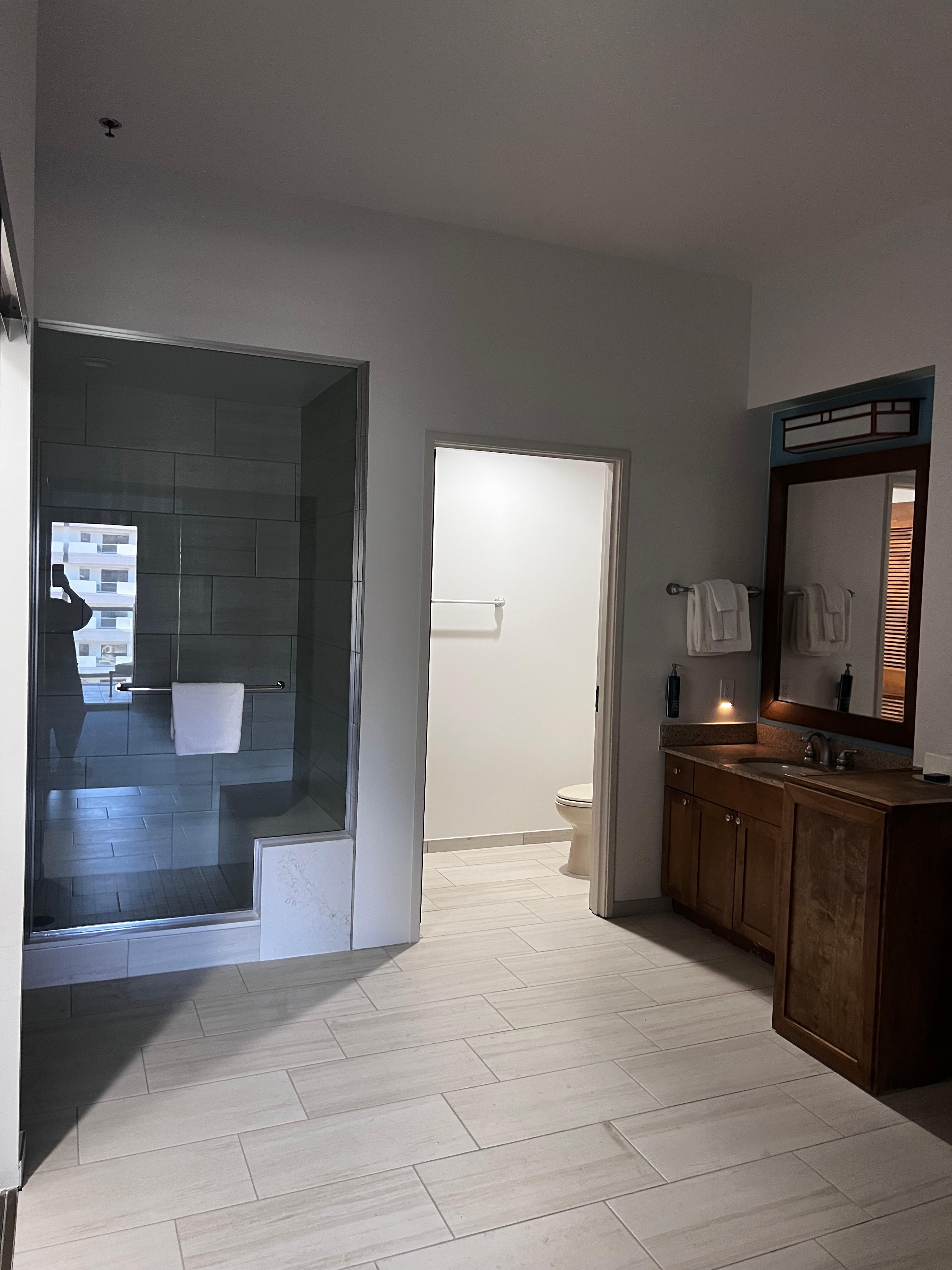 Two huge bathrooms accessible showers, two person bathtub.