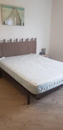 lit en ferraille au lieu d'un sommier