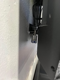 Behind the tv