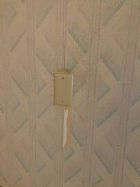 Wall paper ripped out coming off in multiple places