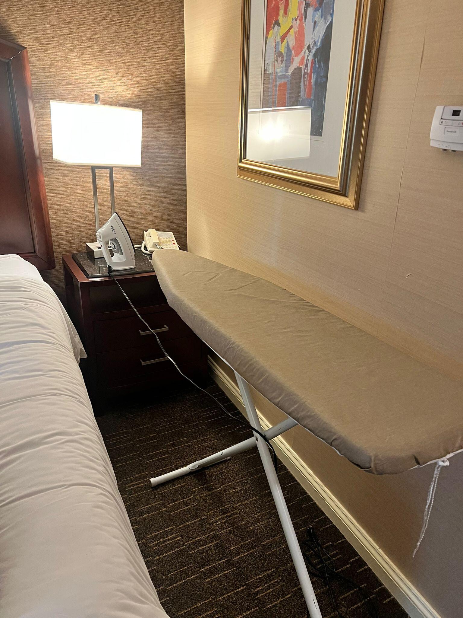 had to keep ironing table between the wall and bed as there is no space in the room btw table was broken have adjusted to get my work done