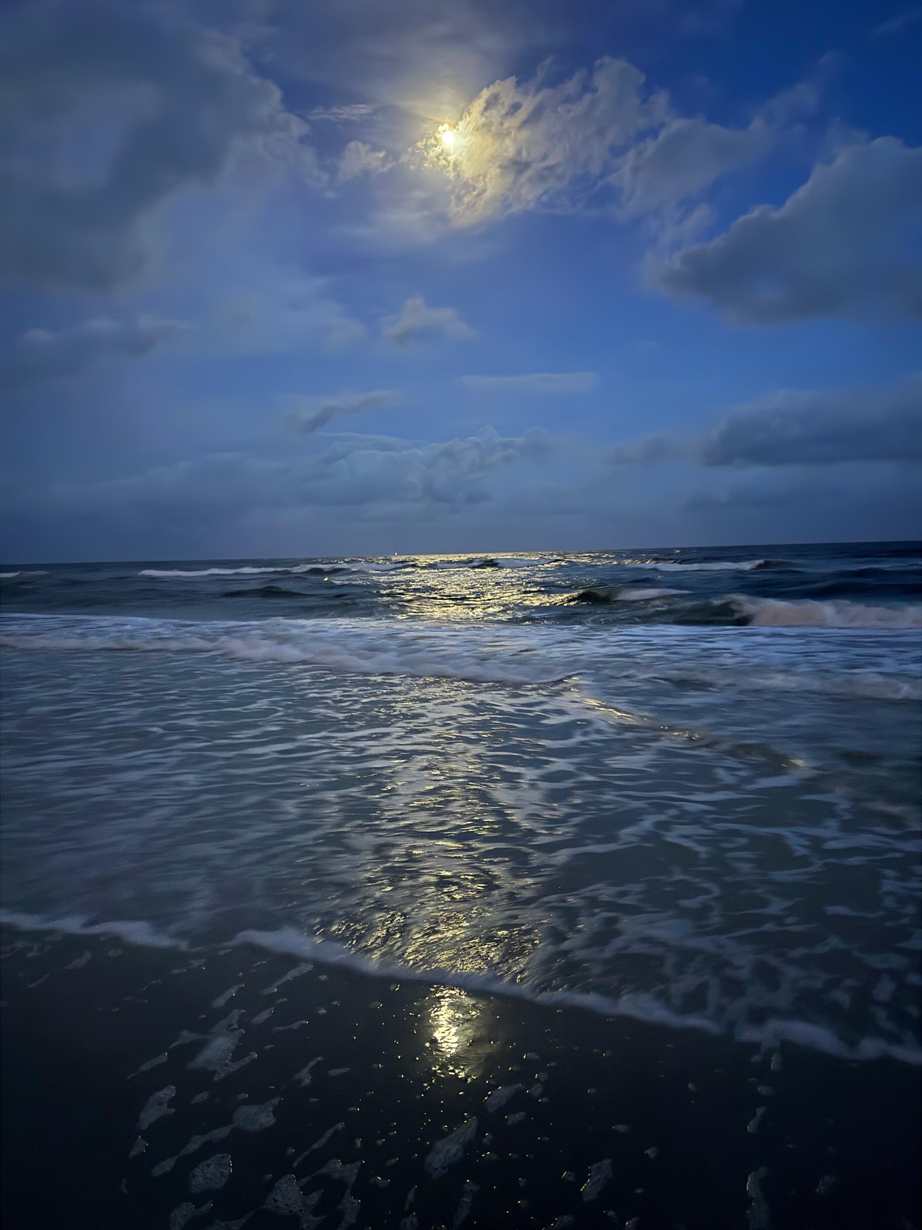 Moonlight beach walk while crabbing.
