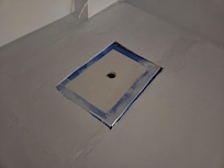 Taped over opening in the ceiling