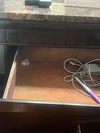 Drugs and paraphernalia found in bedside drawer.