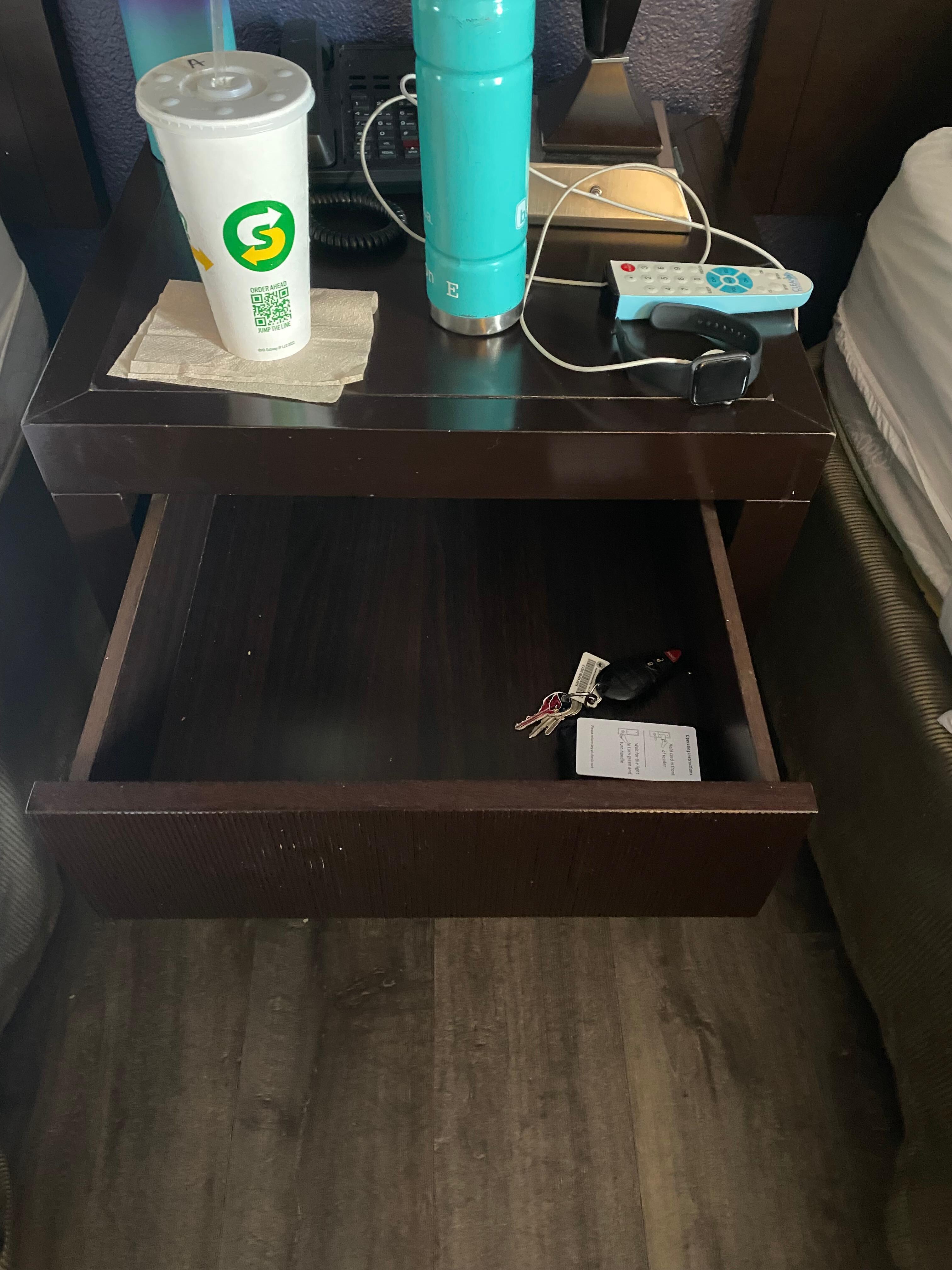 Night stand drawer that would stay closed because the floor was so sloped.