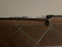 Very untidy attempt at covering the wiring.