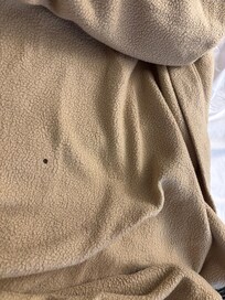 Cigarette burn in blanket