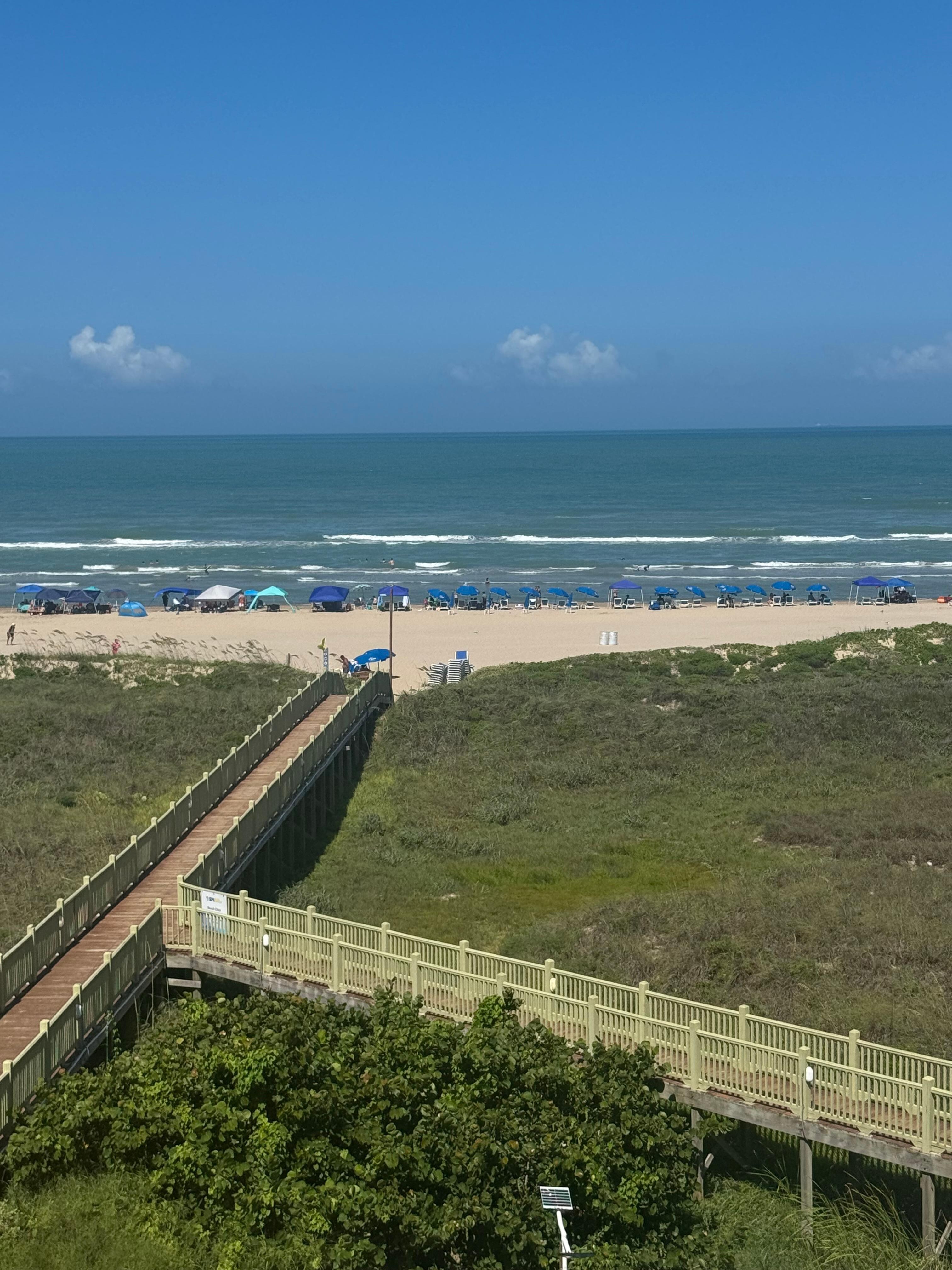 The view of the board walk and beach. 