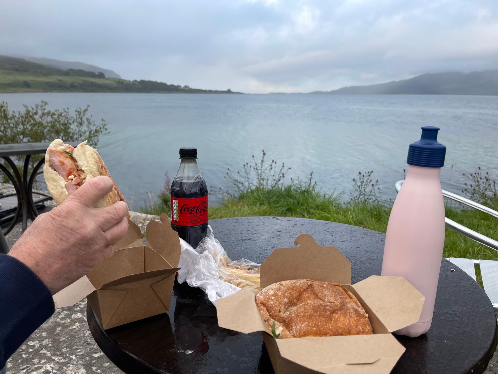 An evening picnic by the sea loch