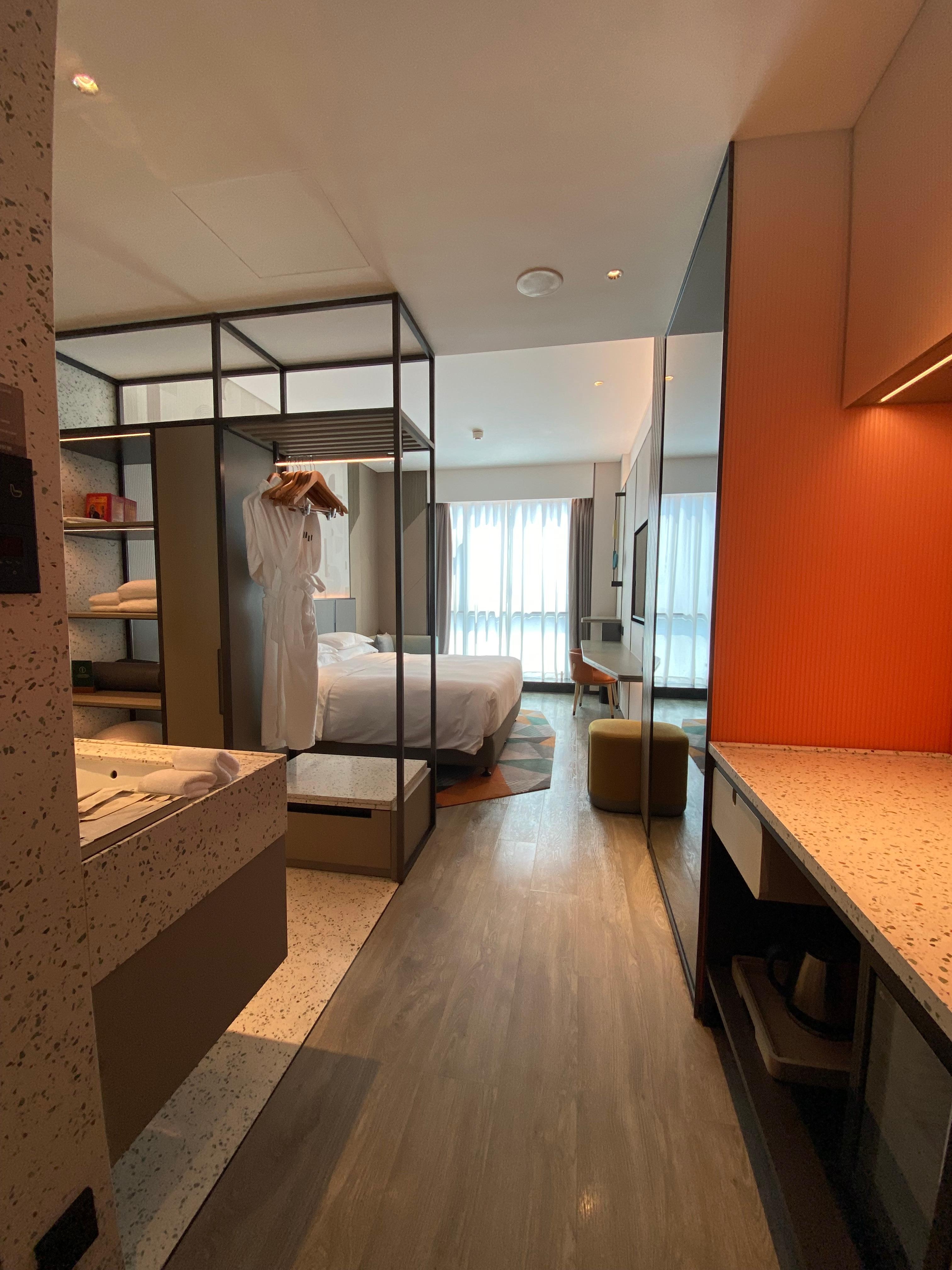 The hotel room is clean and modern.