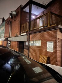 Door is under the awning; sign says authorize persons only, and couldn’t get in
