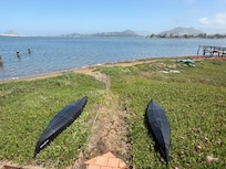 Kayaks in front of the cottage