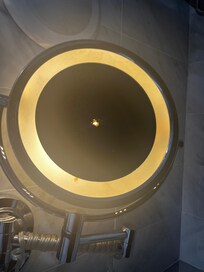 The light around the fracture indicates the light source itself is compromised, concentrating heat and creating a risk, especially with flammable materials like curtains, clothing, or furniture nearby, even without sunlight.