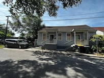 Front of house with van parked