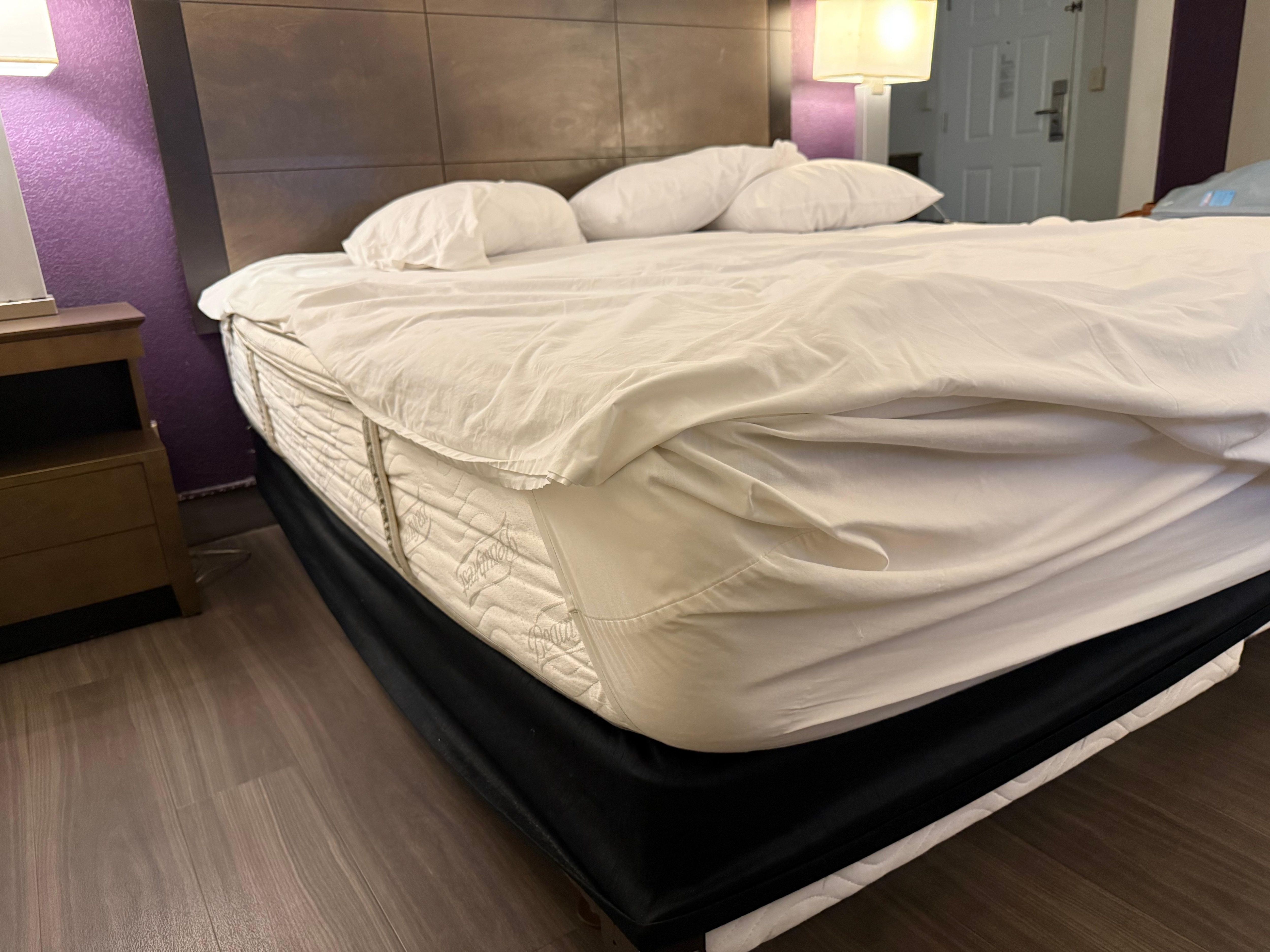 Bed not made with no blankets 