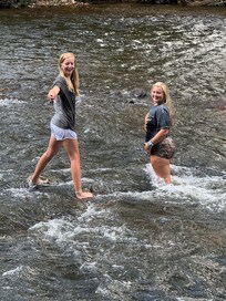 Playing around in the river in the back yard.