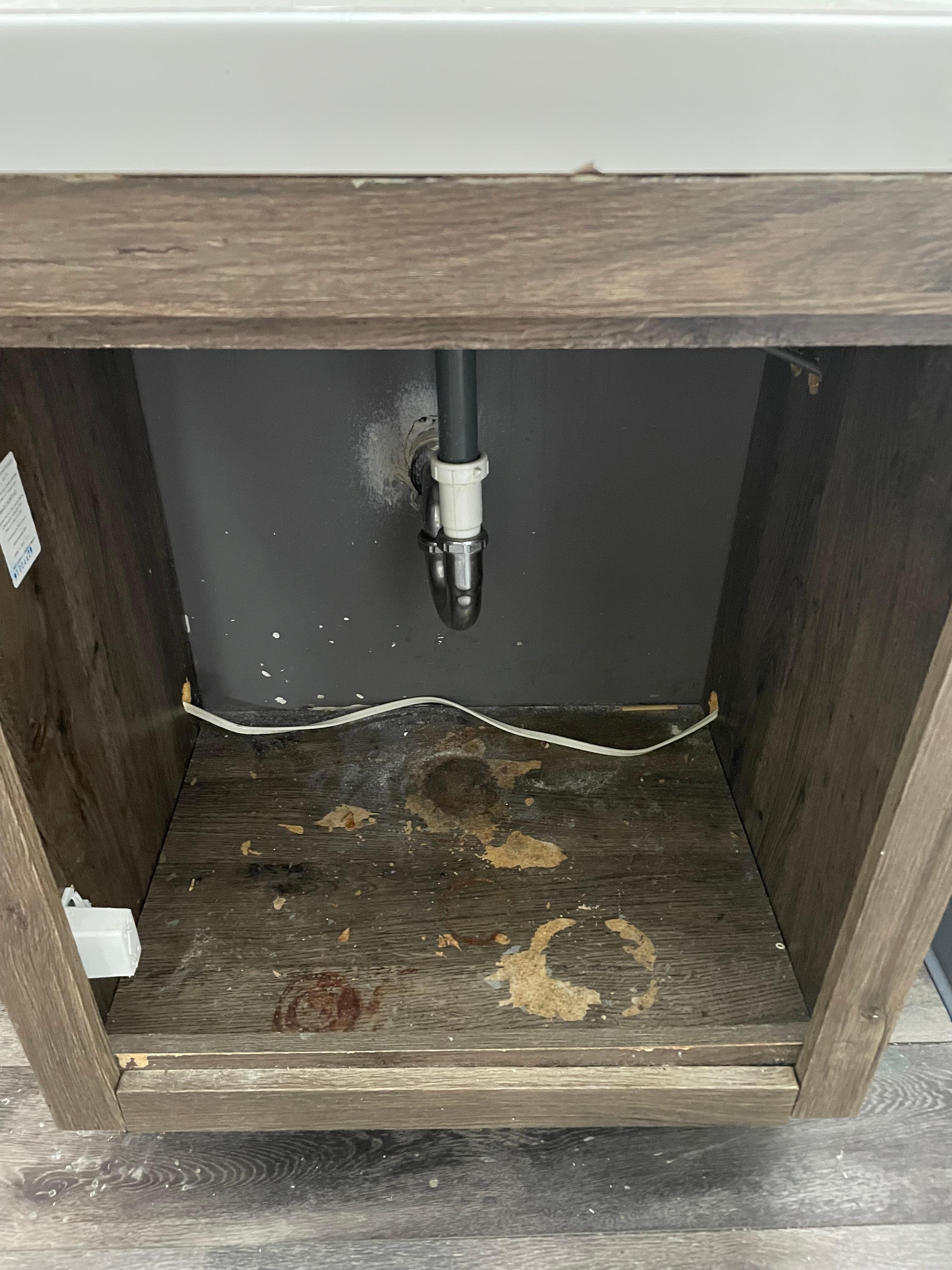 Under the sink 