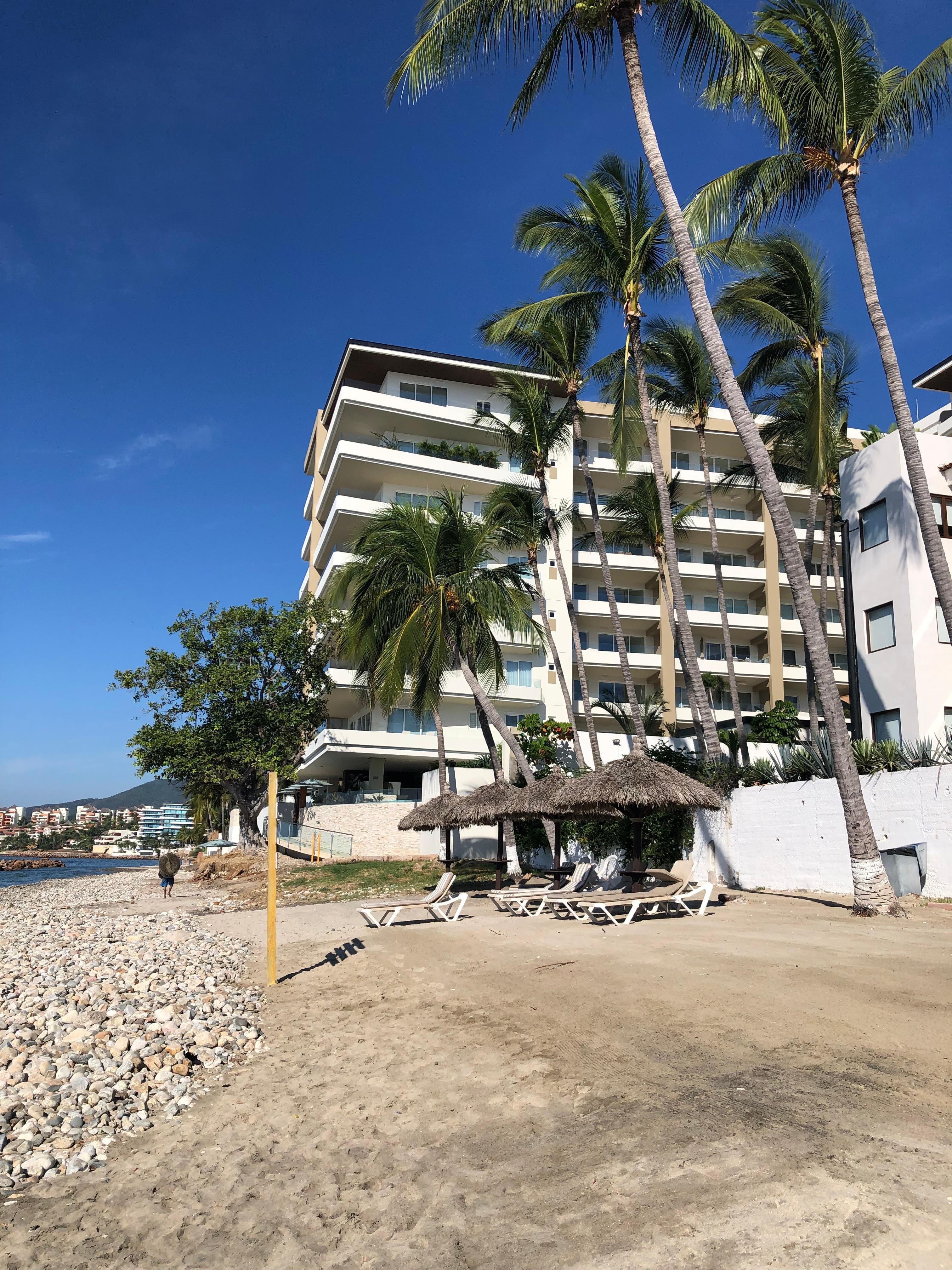 Lovely quiet sandy beach front location with private loungers including bar service 