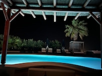 The night view of the pool with the sea behind us was absolutely breathtaking!