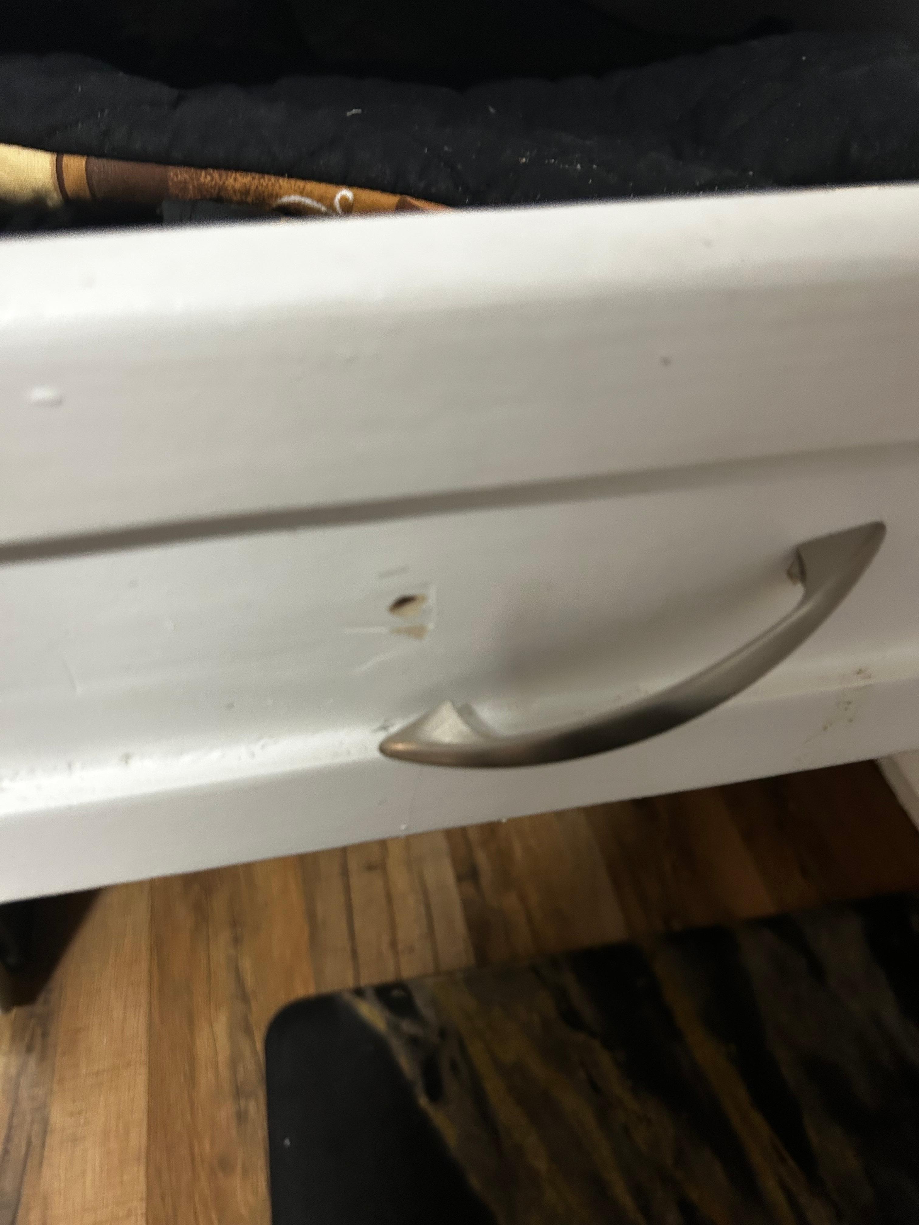 Broken hardware on cabinet drawer