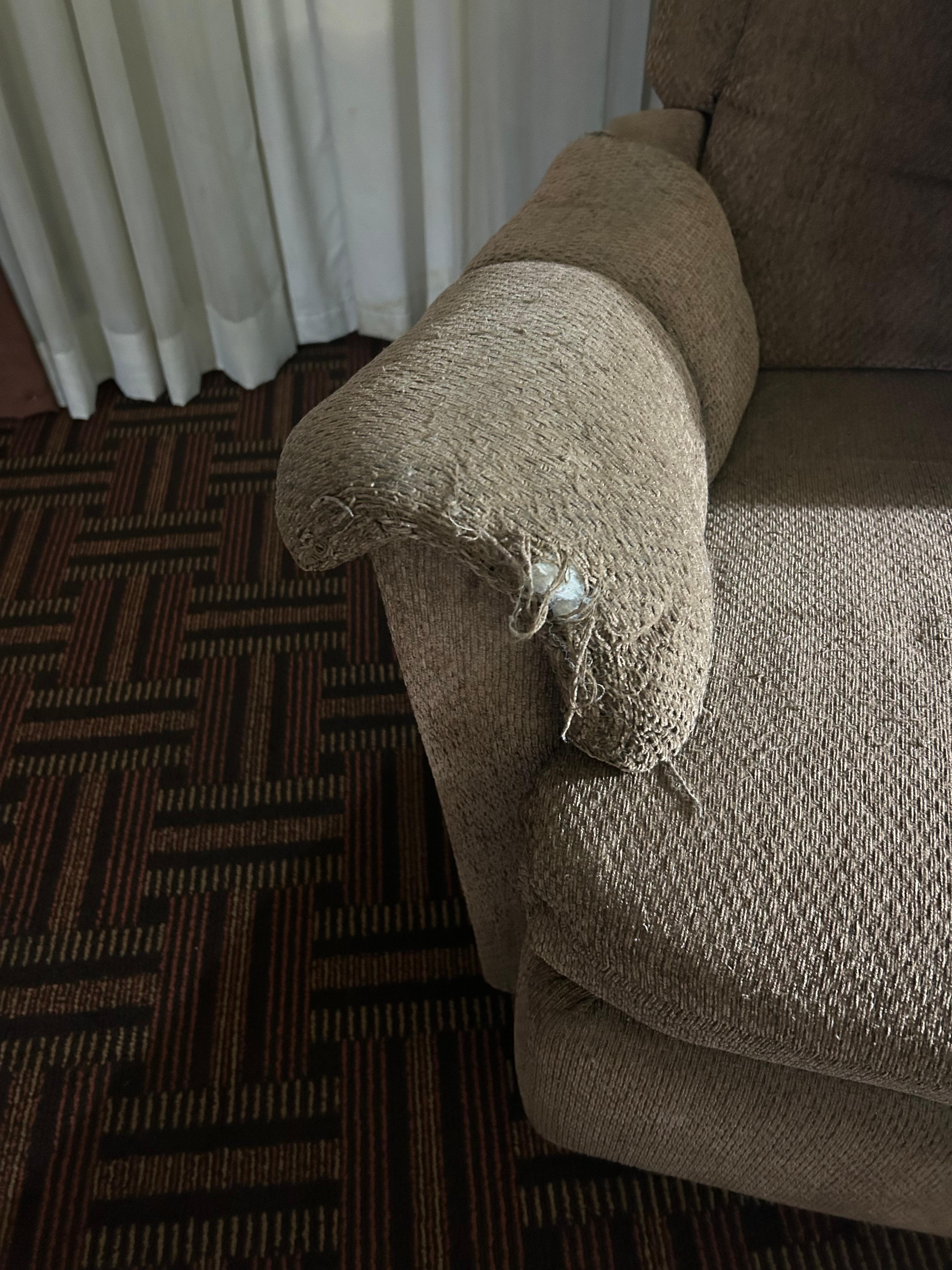 Both arms on this chair looked like this. Replace it!