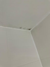 Model on shower ceiling