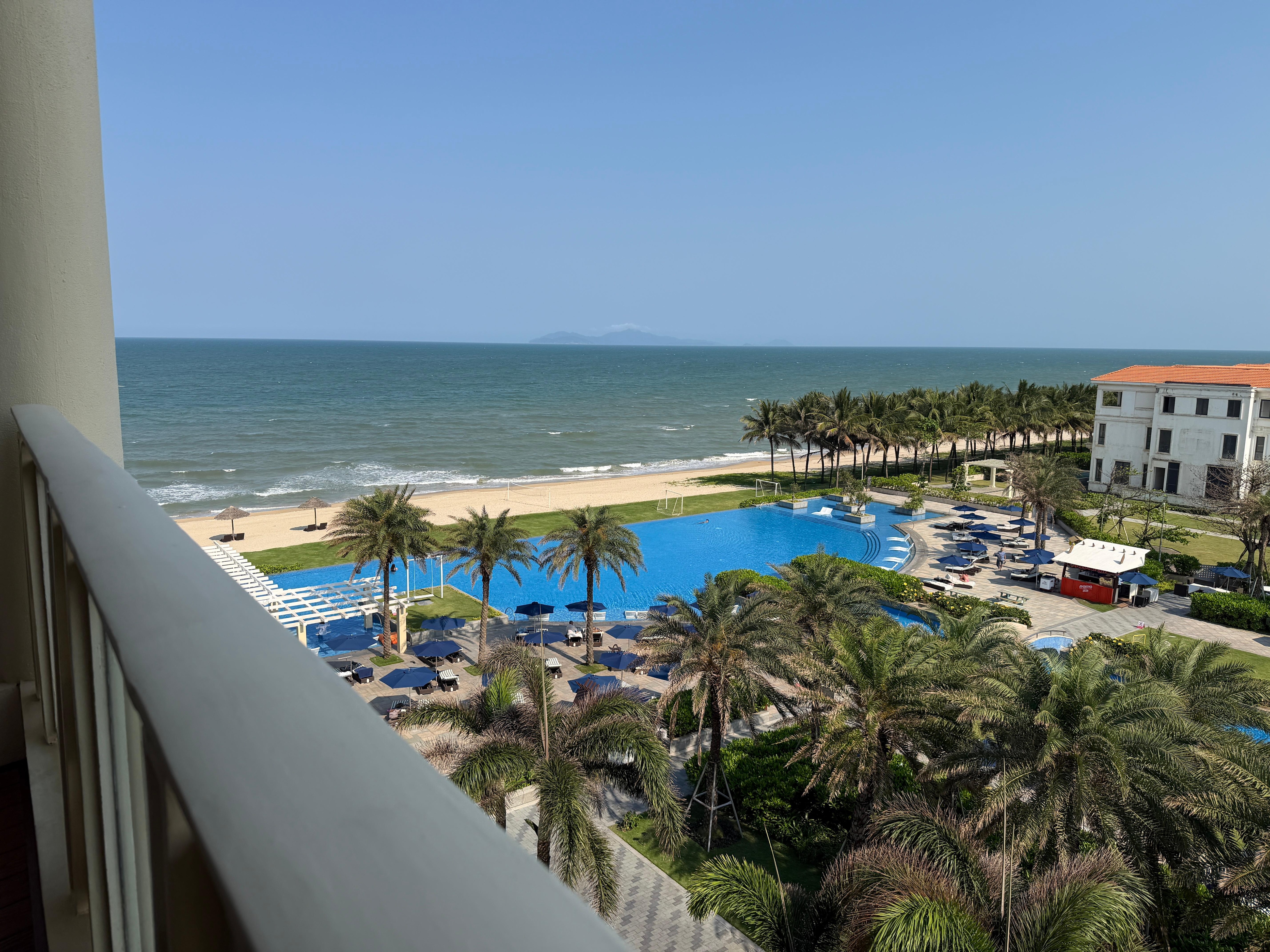 Beautiful pool and ocean view from our balcony. Sea breezes were lovely!
