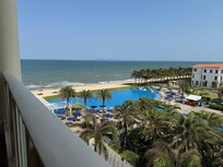 Beautiful pool and ocean view from our balcony. Sea breezes were lovely!