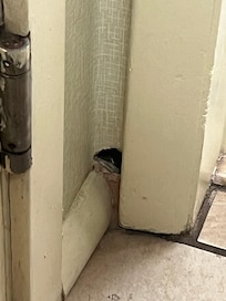 This is the hole in the wall of the room I booked, where the mouse ran into