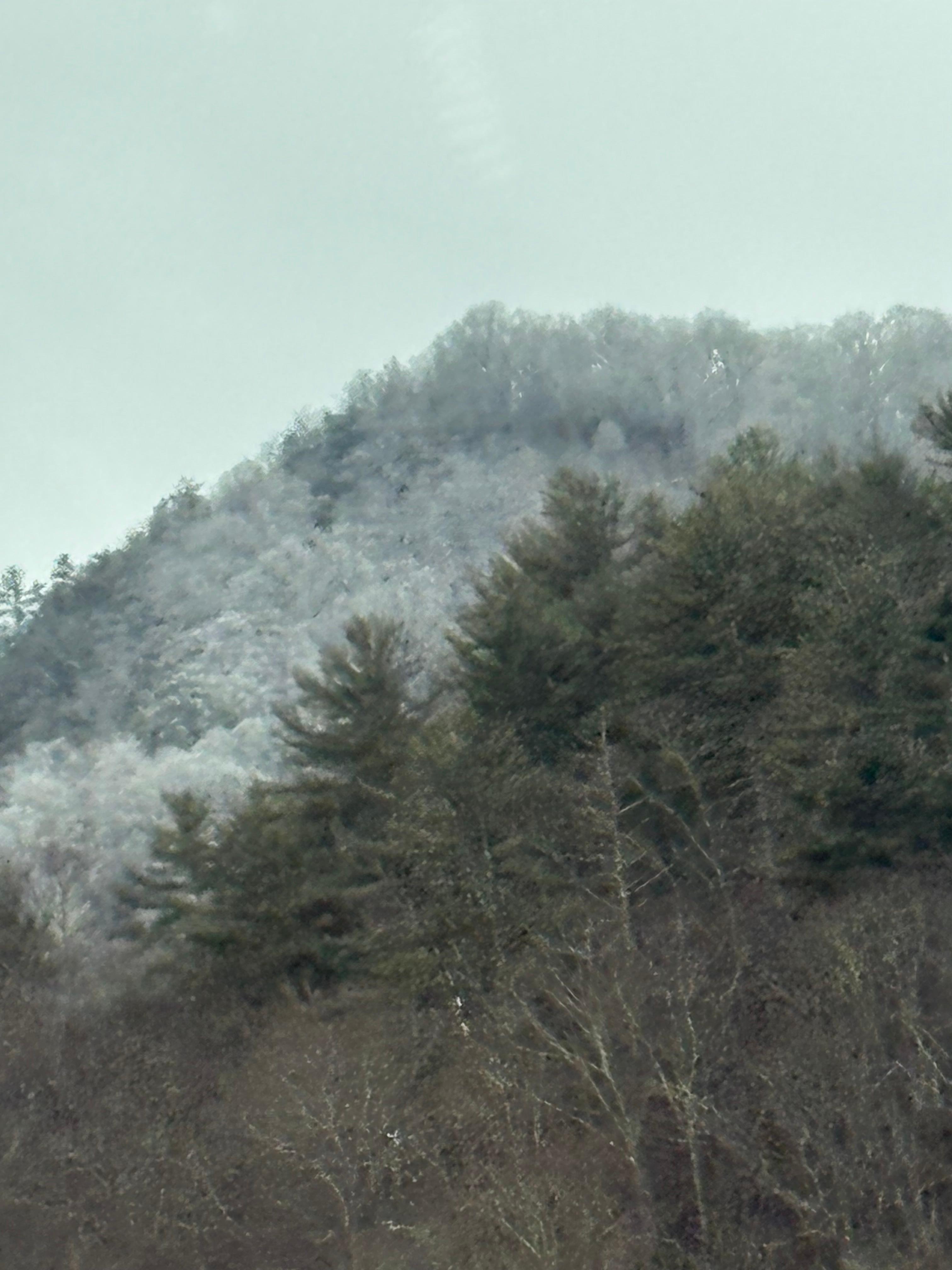 Surrounding snow covered mountains.