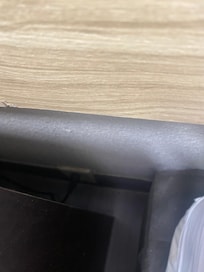 This on the side of the night stand between the beds. Dead bugs and dirt.