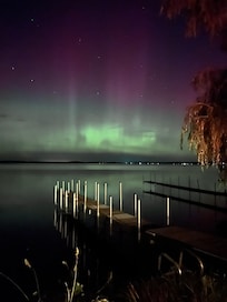 Northern Lights overlooking Sandy Pond. While having a fire.